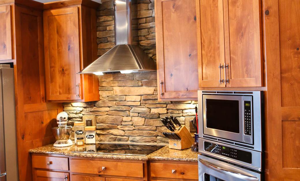 modern appliances in a rustic log home