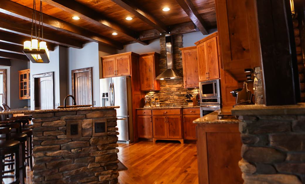 a log cabin kitchen with modern and rustic accents and cabin kitchen cabinets