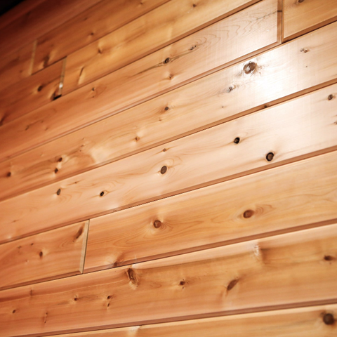 Pre-finished pine tongue and groove paneling.