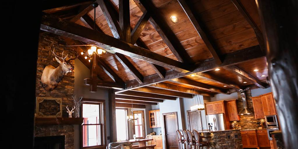 King post trusses make the room look bigger.