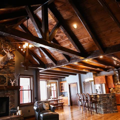 King post trusses make the room look bigger.