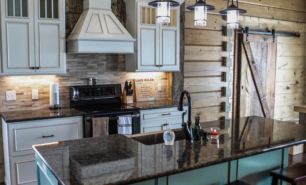 white cabinets in a rustic lake house kitchen