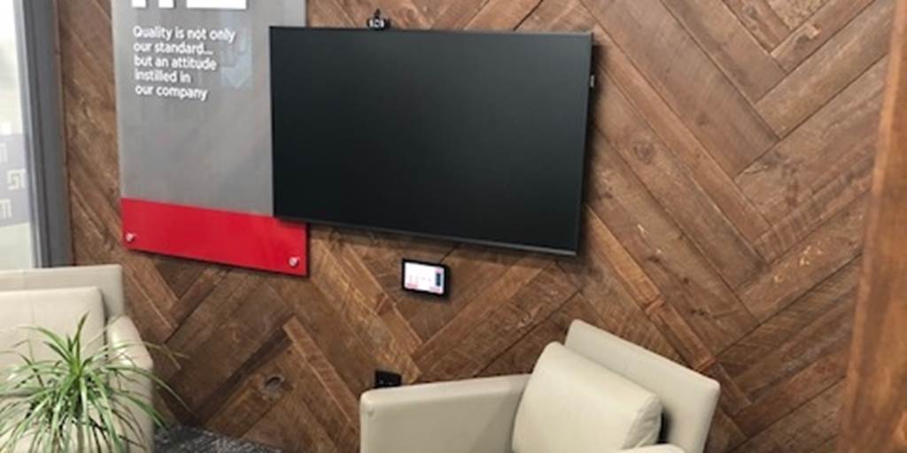 Walnut stained paneling in a zigzag pattern.