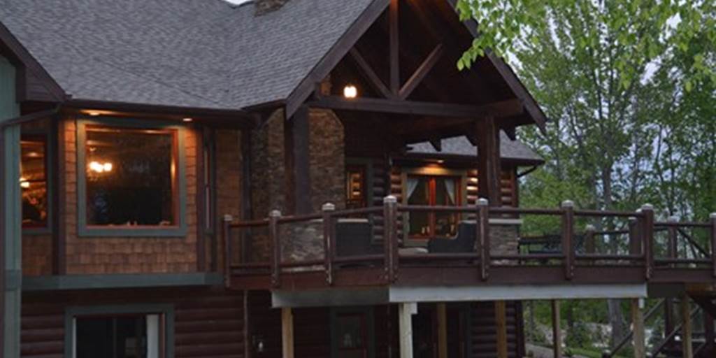 Log house with cedar shake siding
