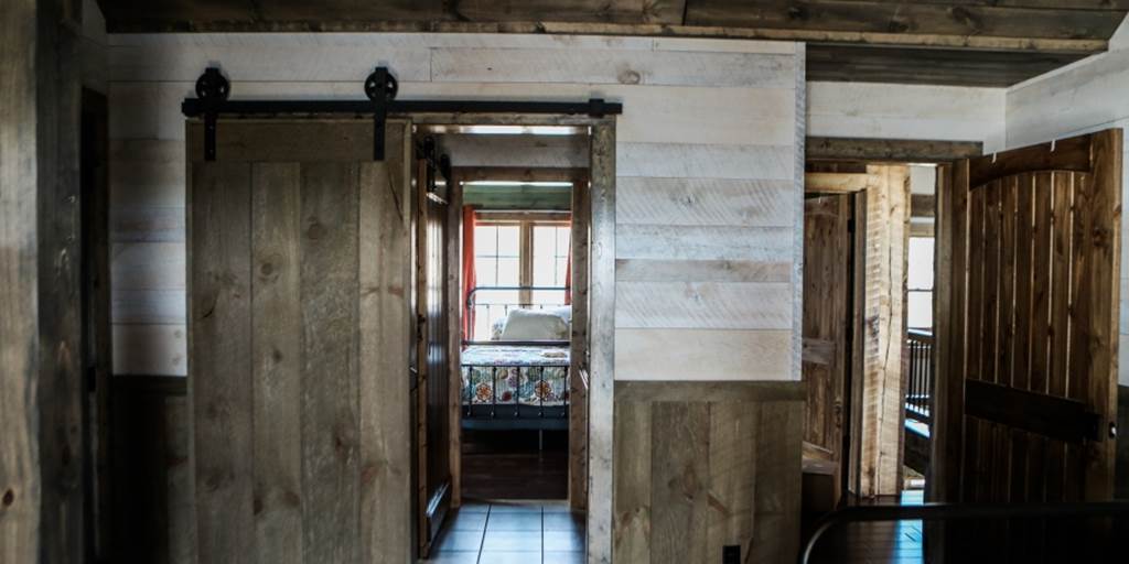 shiplap vs nickel gap, example of home with whitewashed shiplap installed from Northern Log Supply