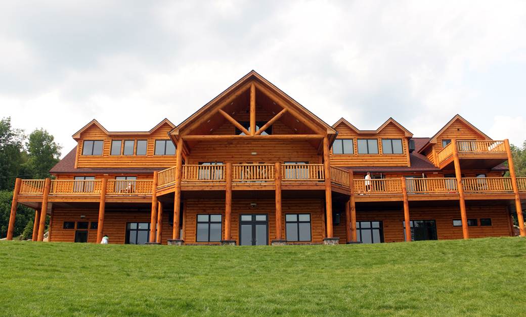 Camp Walden Exterior with 3X8 Pine Hand Hewn Sikkens Cedar Vertical & Inside Corners Classic Railing