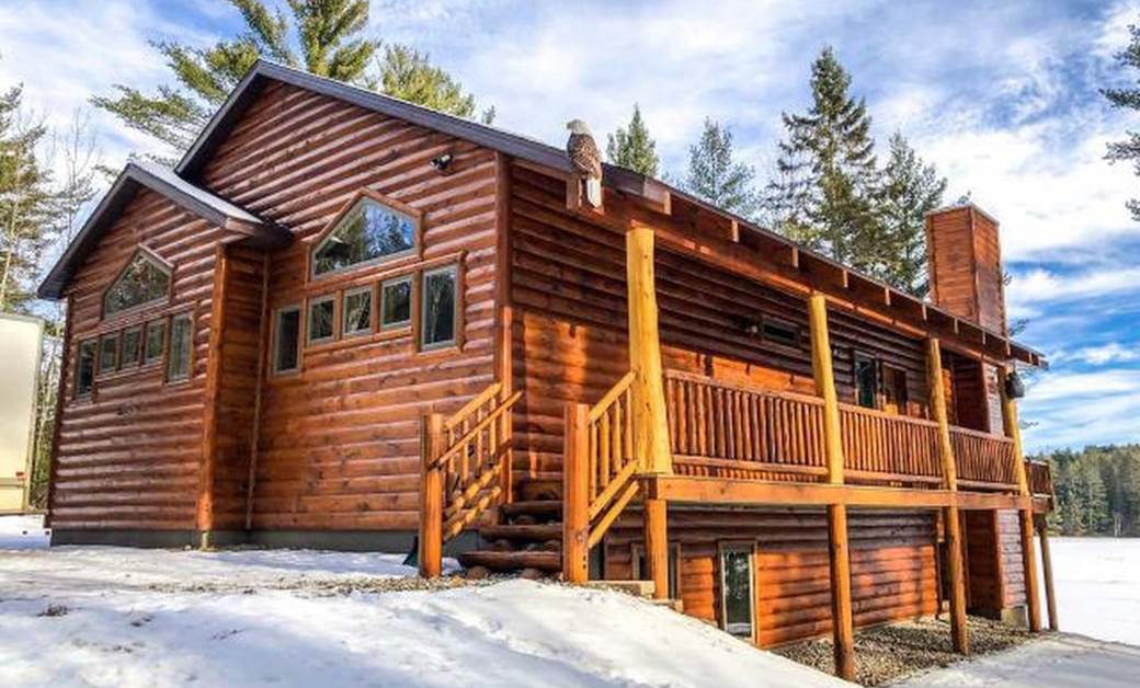 2X8 Log Siding and Classic Log Railing in Butternut