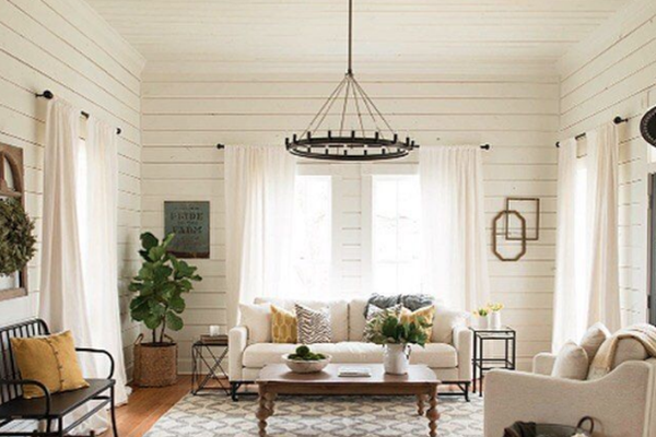 Country white stain on wood paneling in living room.