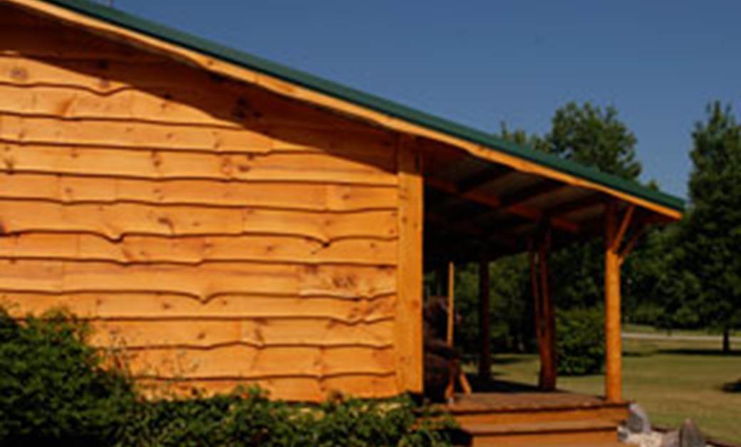 Wavy edge bevel siding on the side of a home.