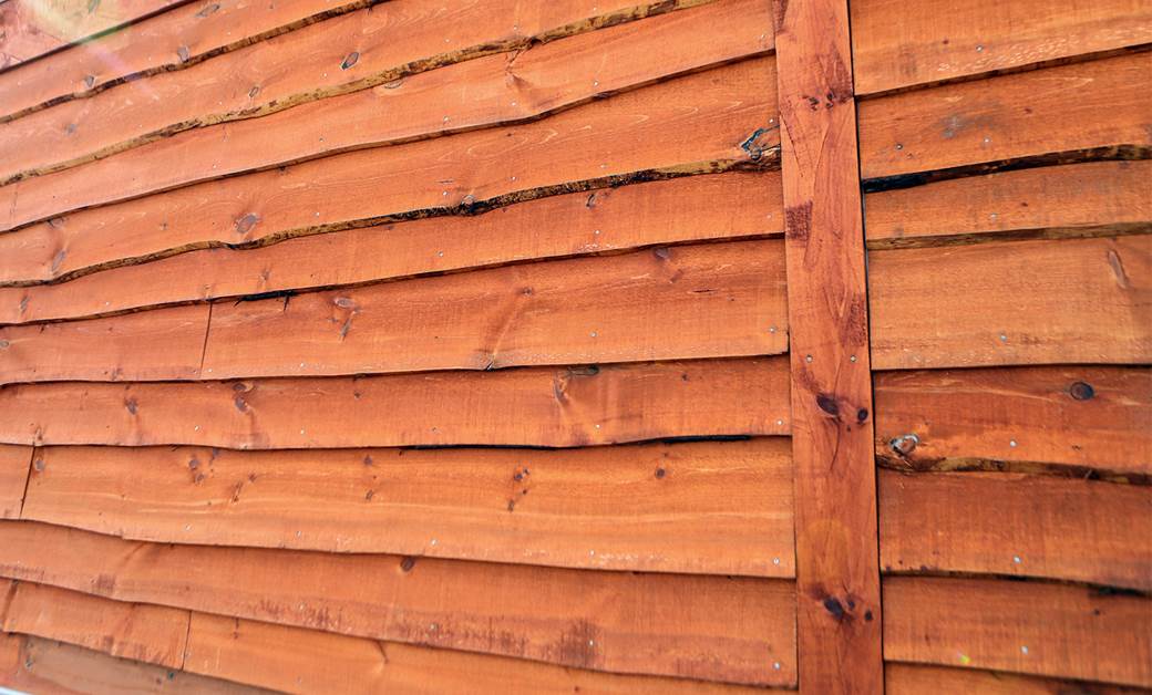 Wavy Edge Siding in Ember