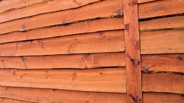 Wavy Edge Siding in Ember