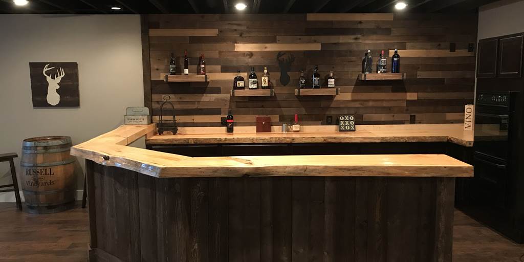 Weathered grey barn wood bar with barn wood siding from Northern Log Supply.