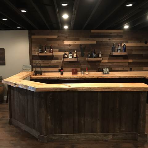 Weathered grey barn wood bar with barn wood siding from Northern Log Supply.