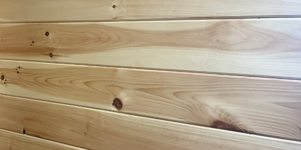 Pre-finished tongue and groove pine paneling.