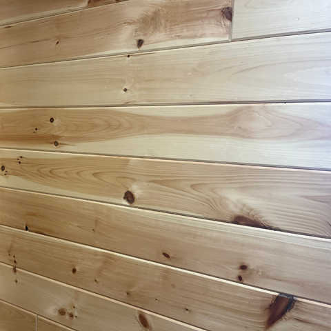 Pre-finished tongue and groove pine paneling.