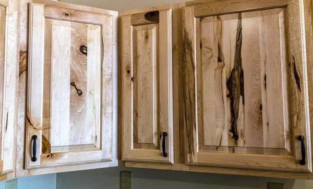 knotty pine cabinets in a log cabin