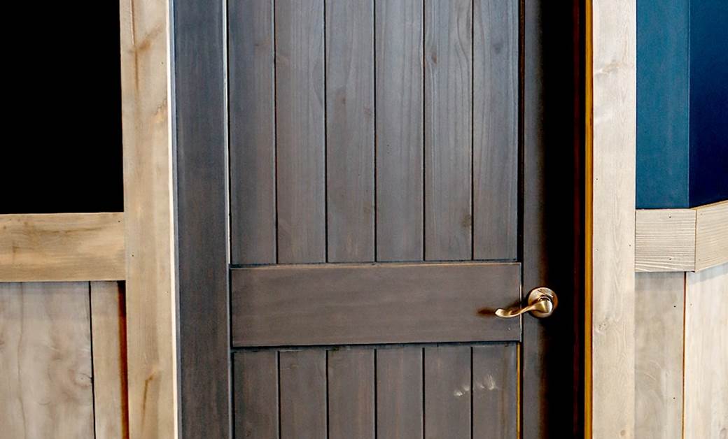 Wall with Pine Paneling and Sedona Arch Door